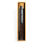 Large test tube with dark red Kampot pepper in a gift box